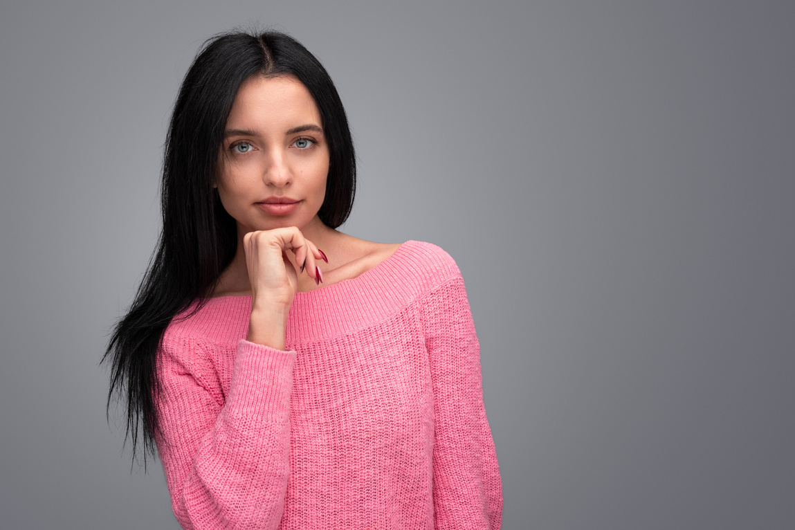 Thoughtful woman looking at camera